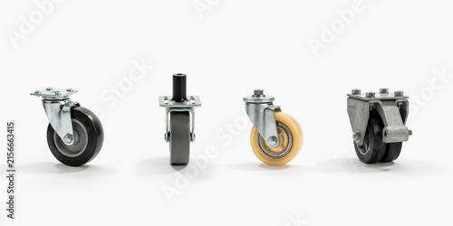 Four industrial swivel casters with different wheels on a white background