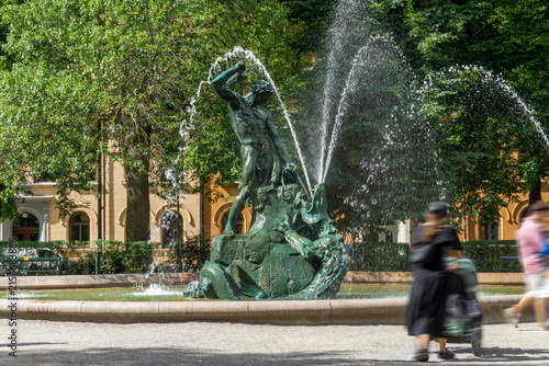 Photography Tors fiske fountain sculpture in Mariatorget park Stockholm