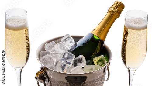 Quadro su tela Champagne bottle in ice bucket with two flutes of bubbly champagne, isolated on