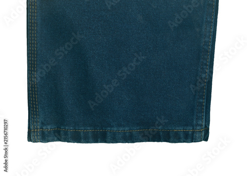 Fotografie The bottom edge of the jeans is made of thick denim in a blue-turquoise shade, hemmed with a classic double hem with open (single, double and triple) yellow-orange stitching on the sides and bottom