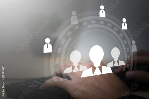 Human resources and talent management concept with digital employee network on a laptop, highlighting recruitment, workforce planning, candidate selection, team building, online hiring, HR technology.