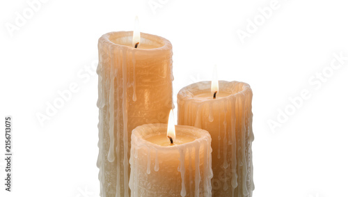 Canvastavla Three dripping pillar candles with lit wicks, isolated on transparent background