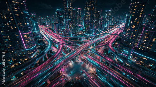 Bright futuristic city skyline illuminated at night
