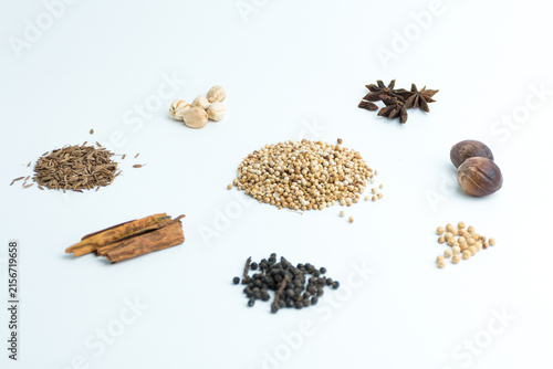 Konstfotografi Assortment of dry cooking spices including cinnamon star anise coriander and nut