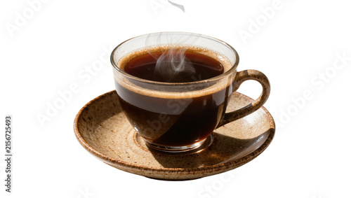 Fotografie Hot steaming dark coffee in clear glass cup with ceramic saucer, isolated on tra