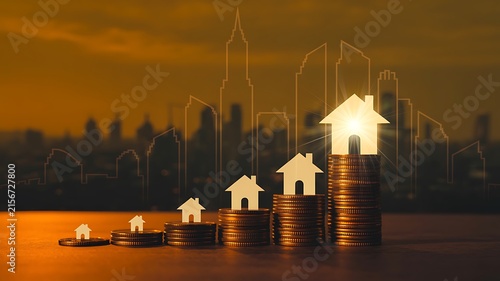 Real estate investment growth concept with stacked coins, rising houses and financial success
