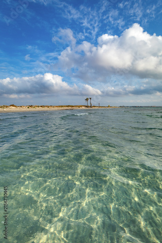 La Llana Beach in the Las Salinas de San Pedro del Pinatar Regional Park, in the Region of Murcia, Spain, with its emerald-coloured sea
