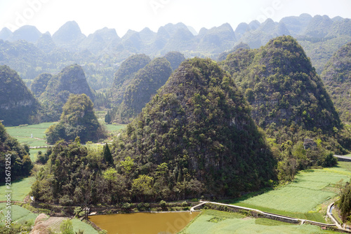 Wanfenglin (Forest of Ten Thousand Peaks) is a breathtaking national park in Xingyi, Guizhou, China. It features one of the world's most stunning karst landscapes, with nearly 20,000 cone-shaped