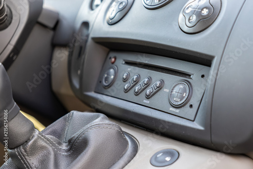 Принти на полотні Automobile dashboard radio control panel and manual gear stick in a vehicle inte