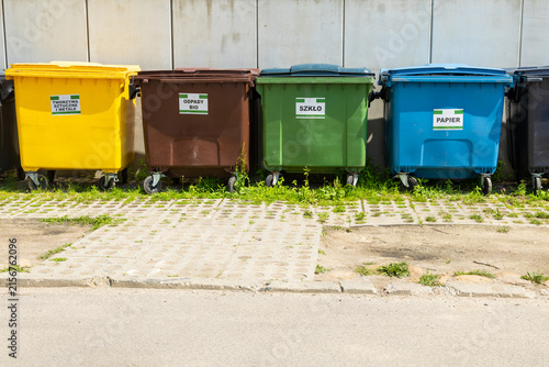 Bild auf Leinwand Color-coded waste sorting bins