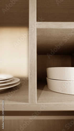 Minimalist Kitchen Interior Featuring Glassware and Plates on Shelves
