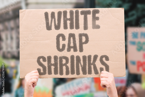 Foto "White Cap Shrinks" The mirror that once bounced sunlight back is now a dark, hungry sea