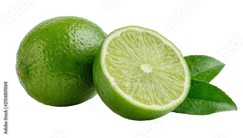 Whole and halved green limes with leaves, isolated on transparent background