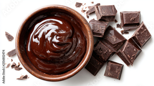 Bowl of Melted Dark Chocolate with Broken Chocolate Pieces on White Background