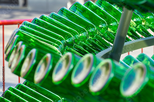 Fragment of the unusual Christmas tree made from the green glass bottles           