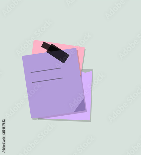 Stack of colorful folders with tape on top