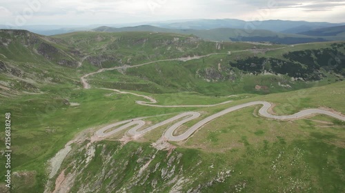 Aerial view of the winding Transalpina road in the Carpathian Mountains on a summer morning
