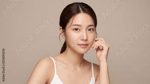Beautiful Young Asian Woman with Clean Fresh Skin