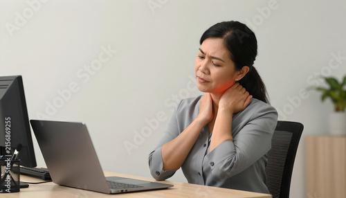 Employee Experiencing Neck Pain at Office Workstation: Health Concern