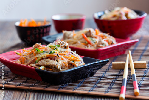 Stir-fried glass noodles with pork.