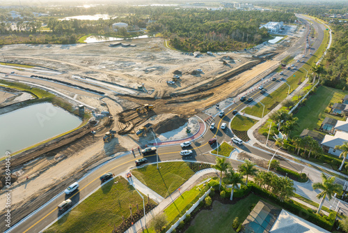 Industrial roadworks. Roundabout on wide American highway under construction. Development of transportation system for rapid transit