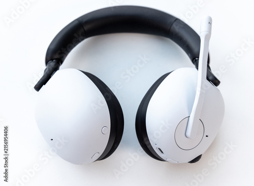 Bild auf Leinwand White and black gaming headset with microphone on a white background