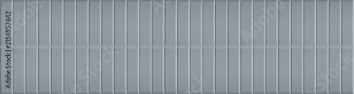 Panoramic view of grey blue vertical finger tiles with fine line bevel edges in grid layout