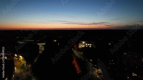 High Angle Night Footage of Illuminated Buildings and Roads with Traffic at Best Tourist Attraction Destination of England at Bournemouth City with Sandy Beach and Ocean of Great Britain, 