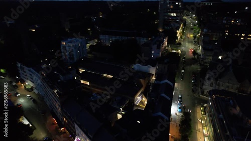 High Angle Night Footage of Illuminated Buildings and Roads with Traffic at Best Tourist Attraction Destination of England at Bournemouth City with Sandy Beach and Ocean of Great Britain, 
