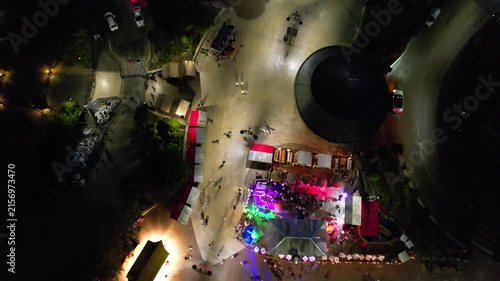 High Angle Night Footage of Illuminated Buildings and Roads with Traffic at Best Tourist Attraction Destination of England at Bournemouth City with Sandy Beach and Ocean of Great Britain, 