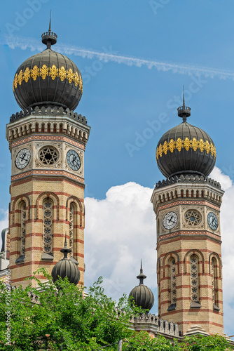 Photography Twin clock towers and patterned onion domes of Dohany Street Synagogue in the Er