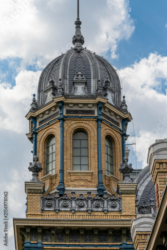 Cuadro en lienzo Ornate domed tower with arched windows and brickwork at Nyugati Railway Station