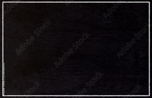Empty black chalkboard background with white chalk border frame