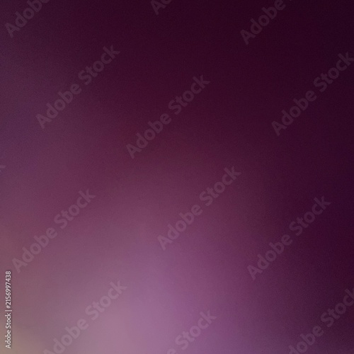 Abstract blurred purple gradient background with soft glow