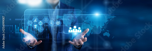 Принти на полотні Creative team work coordinator holding in hands project briefs