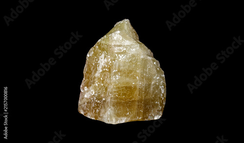 Obraz na plátne Golden Gemstone Texture: Yellow Calcite Isolated on Black Background