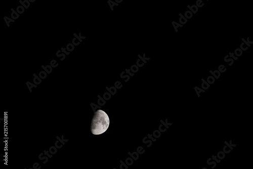 Obraz na plátne Waxing gibbous moon isolated against a dark night sky
