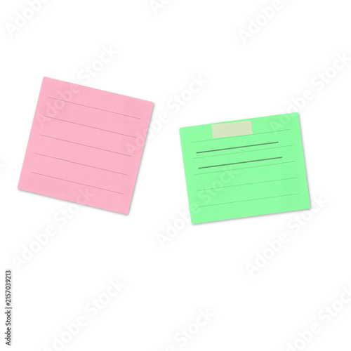 Two colorful sticky notes with grid and plain designs
