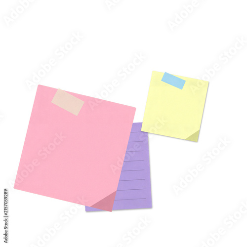 Two colorful sticky notes on a flat surface
