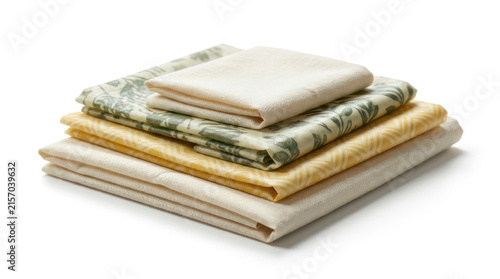 Stack of Folded Fabric Sheets with Floral Patterns.