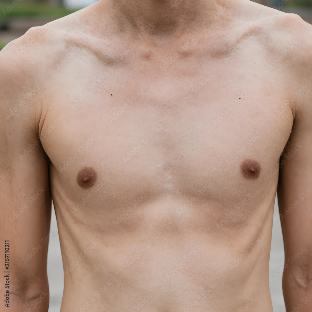 Fototapeta premium Bare male torso with visible collarbones and chest, health and body image, skin texture and human anatomy