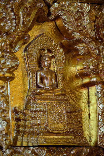 Gilded Buddha Relief and Ornate Buddhist Art at Wat San Pa Yang Luang, Lamphun, Thailand