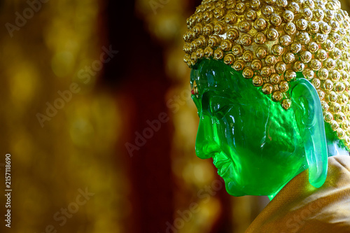 Green Emerald Buddha Replica Profile with Copy Space at Wat San Pa Yang Luang, Thailand