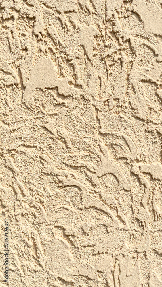 Naklejka premium Textured Beige Wall Surface Close Up Background Abstract