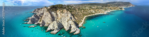 Capo Vaticano Calabria Italy 4:1 aspect ratio panorama ultra high resolution. Drone view of dramatic cliffs and turquoise sea with boats. Italian tropical coastline fine art world print