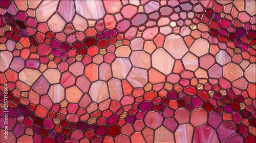 Abstract background with colorful geometric mosaic pattern and red and pink honeycombed shapes