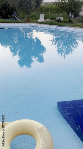 Clear blue swimming pool illuminated at afternoon in a luxury resort