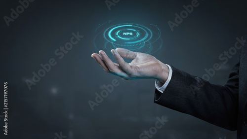 Businessman hand holding digital net promoter score hologram interface in air for customer experience tracking