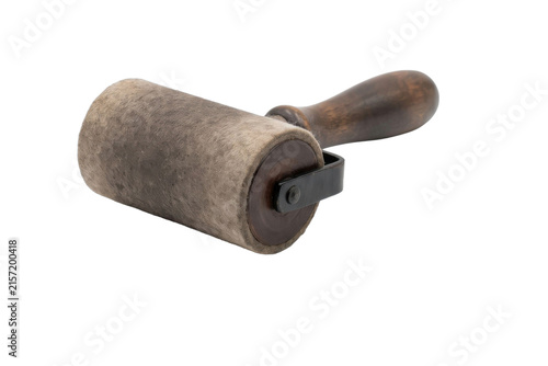Картината върху платно Vintage wallpaper pasting roller with wooden handle and felt cylinder