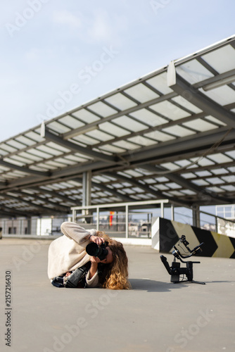 Принти на полотні Creative photographer capturing unique angles in an industrial outdoor setting
